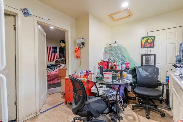 a bathroom with a toilet and a shower curtain