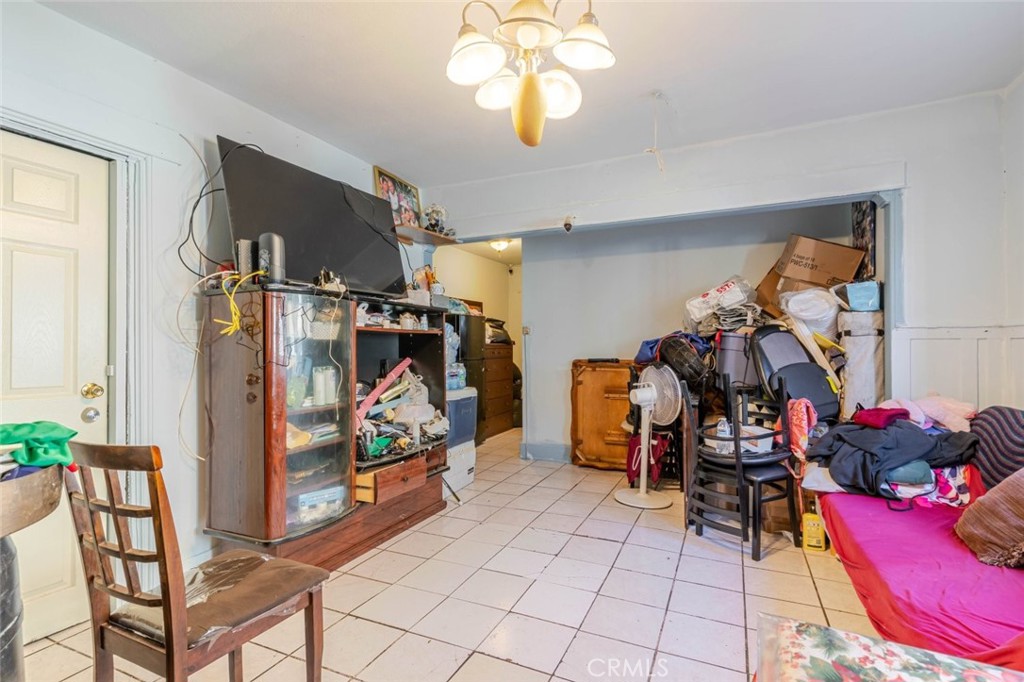 811 East 43rd Place Los Angeles, CA 90011 - Photo 6 of 31 a view of a room with gym equipment
