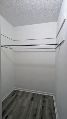 a view of a room with racks on the wall