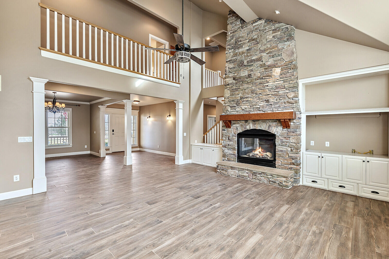2225 Old Stage Road Central Point, OR 97502 - Photo 4 of 37 an entryway and livingroom with fireplace