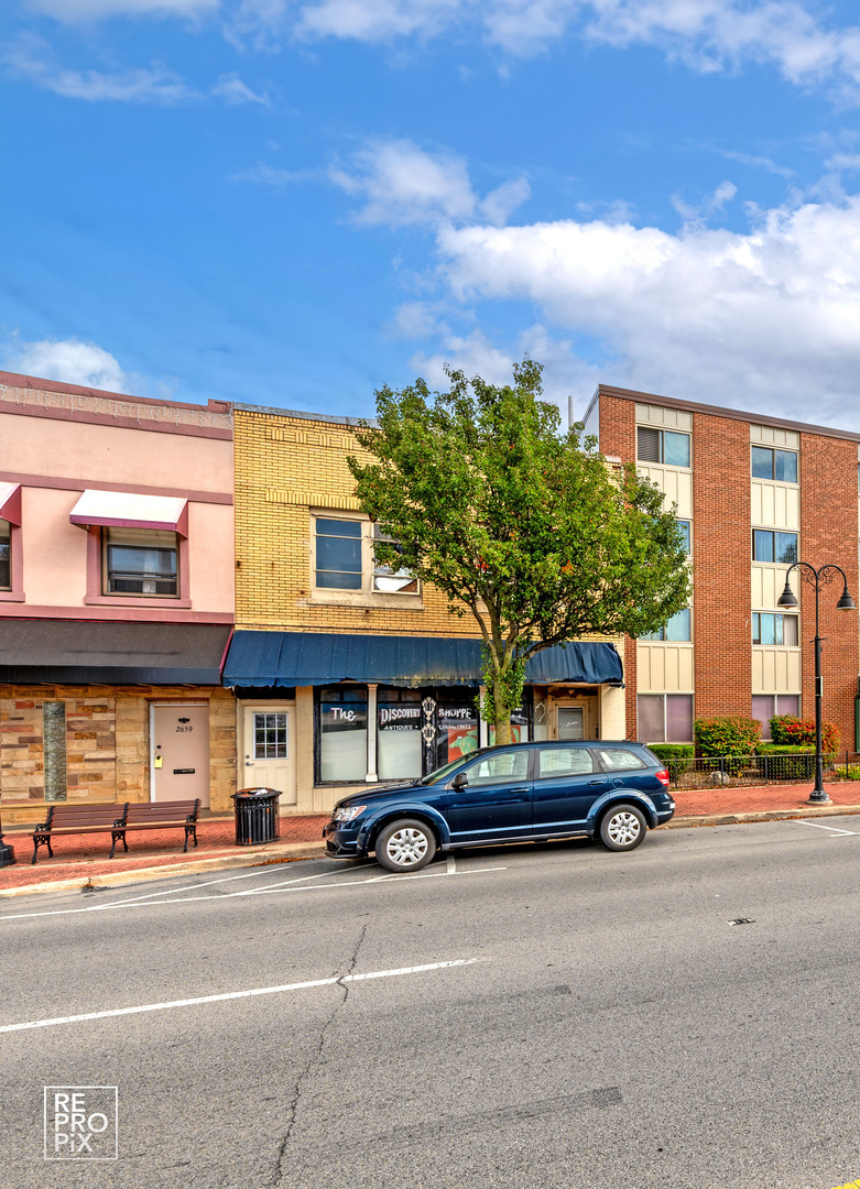 a car parked in front of a building