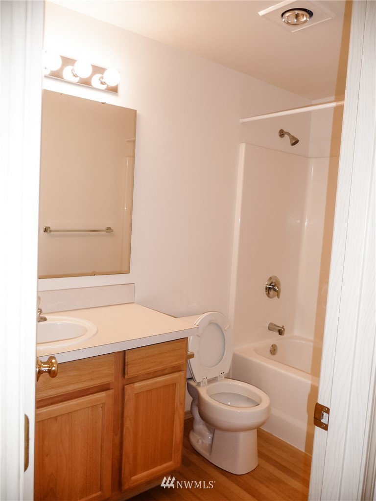 19723 Isabella Lane Southwest Rochester, WA 98579 - Photo 10 of 11 a bathroom with a toilet and a sink