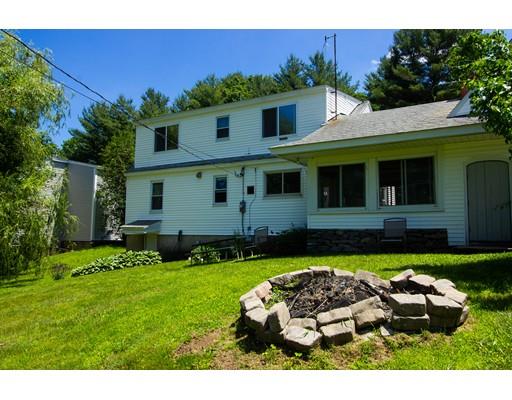 34 Gatehouse Road Westminster, MA 01473 - Photo 6 of 22 a front view of a house with a yard table and chairs