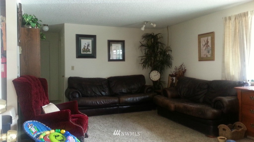 8440 178th Avenue Southwest Rochester, WA 98579 - Photo 4 of 15 a living room with furniture and a window