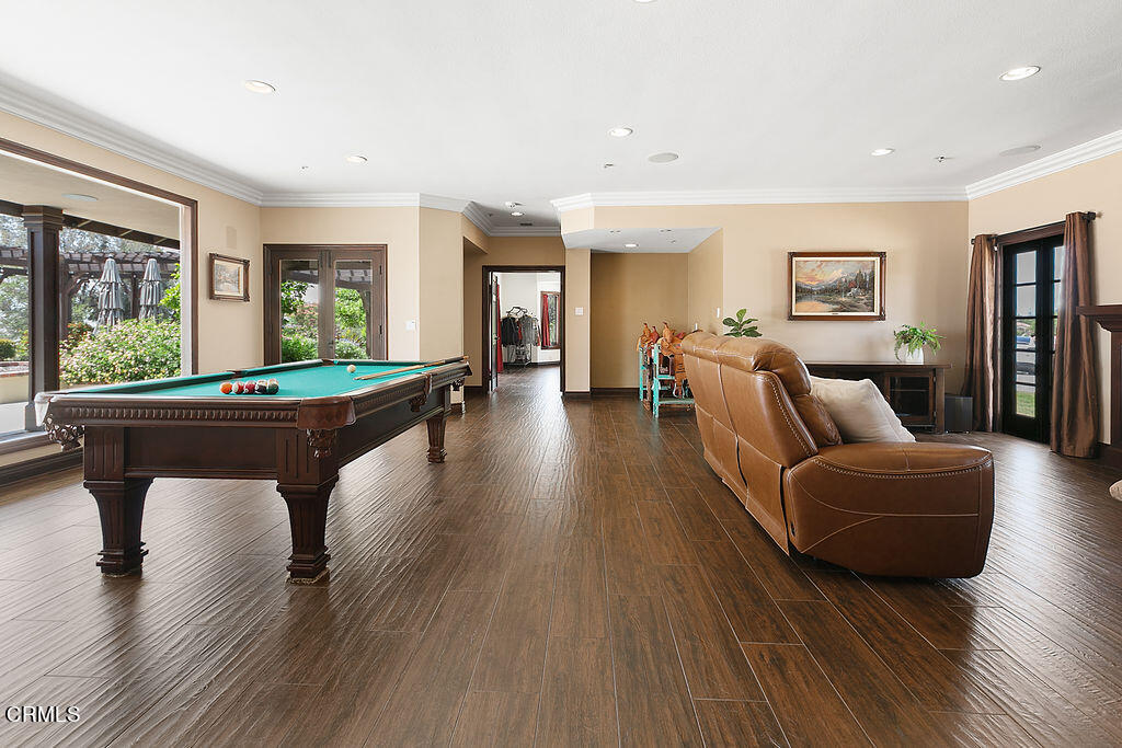95 Avocado Place Camarillo, CA 93010 - Photo 33 of 74 a living room with furniture and a wooden floor