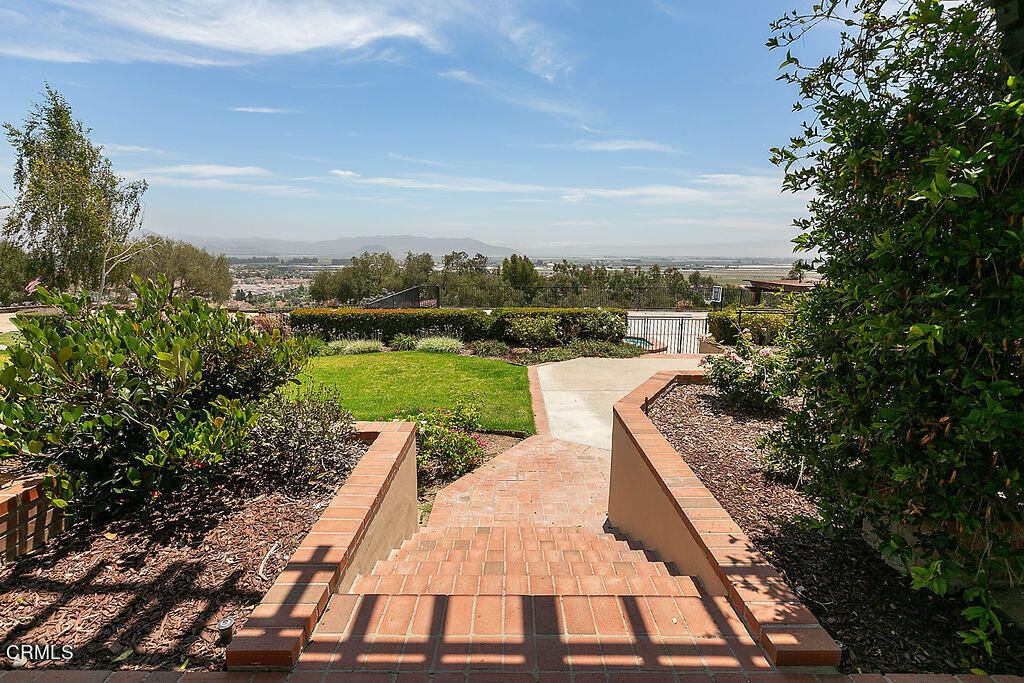 95 Avocado Place Camarillo, CA 93010 - Photo 6 of 74 a view of a lake with a garden