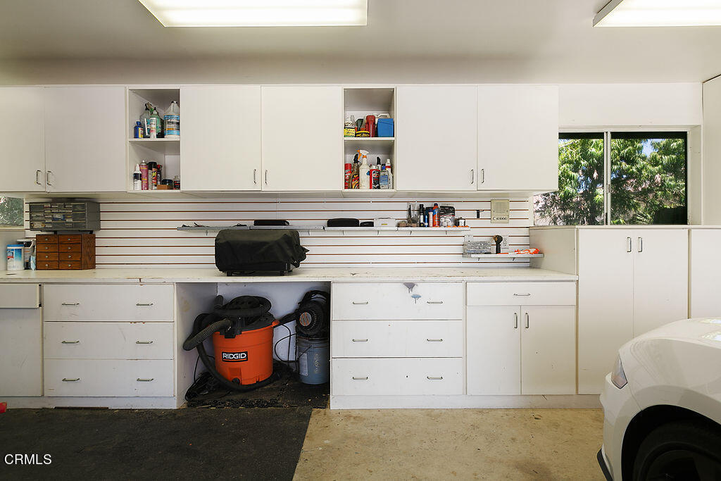 95 Avocado Place Camarillo, CA 93010 - Photo 64 of 74 a kitchen with a cabinets and white appliances