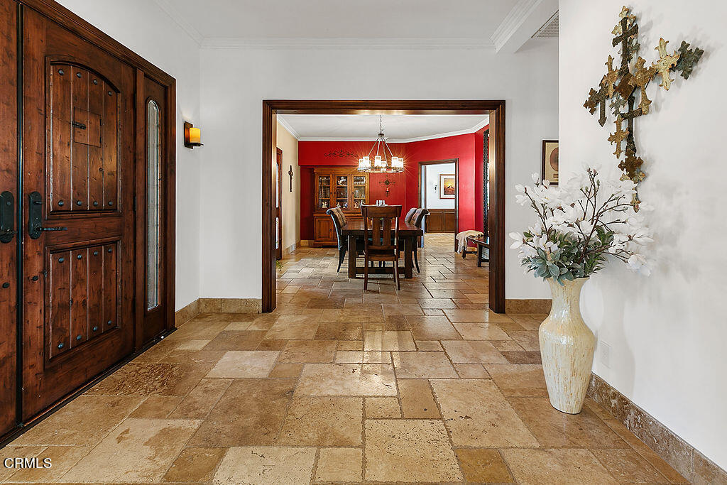 95 Avocado Place Camarillo, CA 93010 - Photo 7 of 74 a view of a porch with dining table and chairs