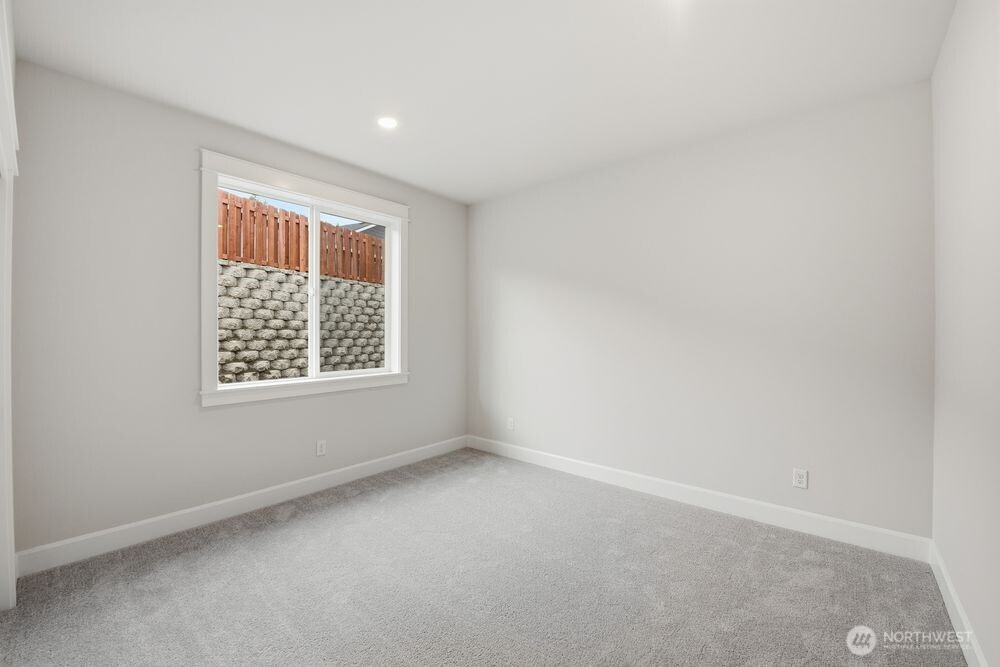 2609 Acer Loop Southeast Lacey, WA 98513 - Photo 12 of 28 an empty room with a window