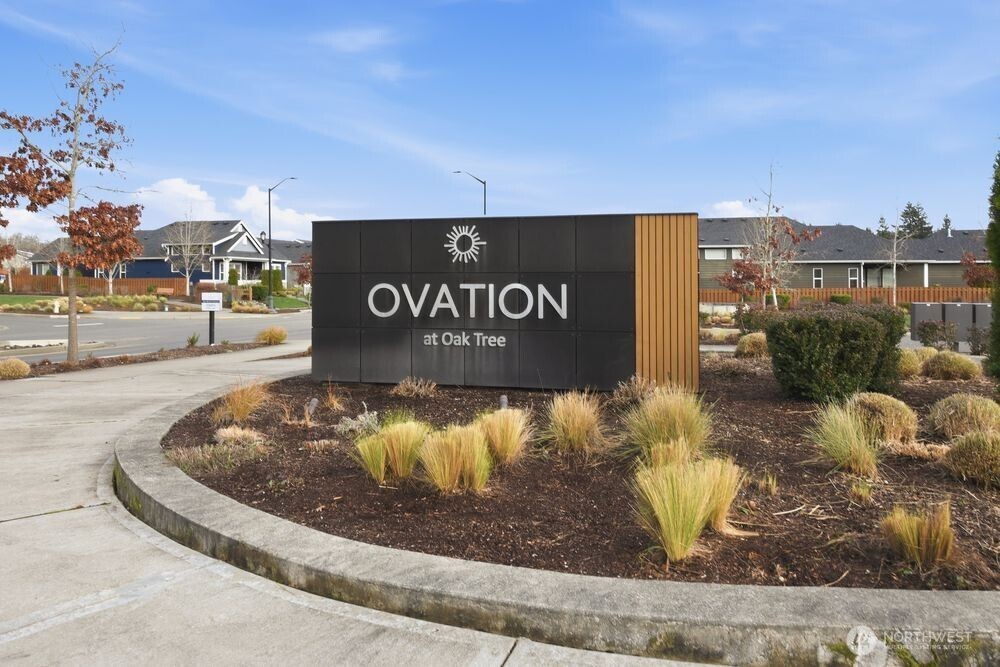 2609 Acer Loop Southeast Lacey, WA 98513 - Photo 14 of 28 a view of outdoor space with a garden and signage