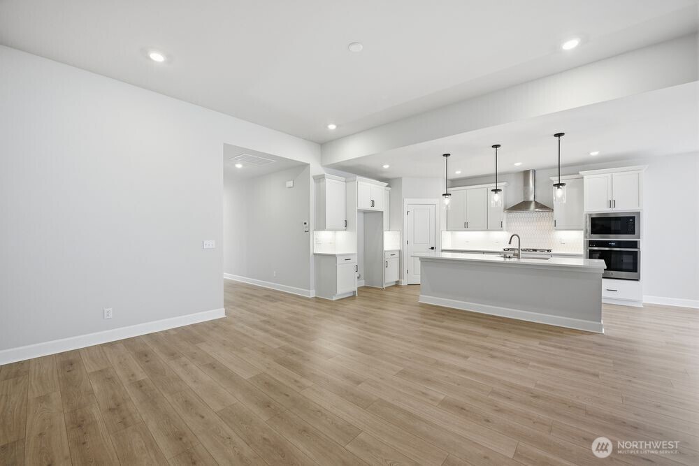 2609 Acer Loop Southeast Lacey, WA 98513 - Photo 7 of 28 a view of kitchen with wooden floor