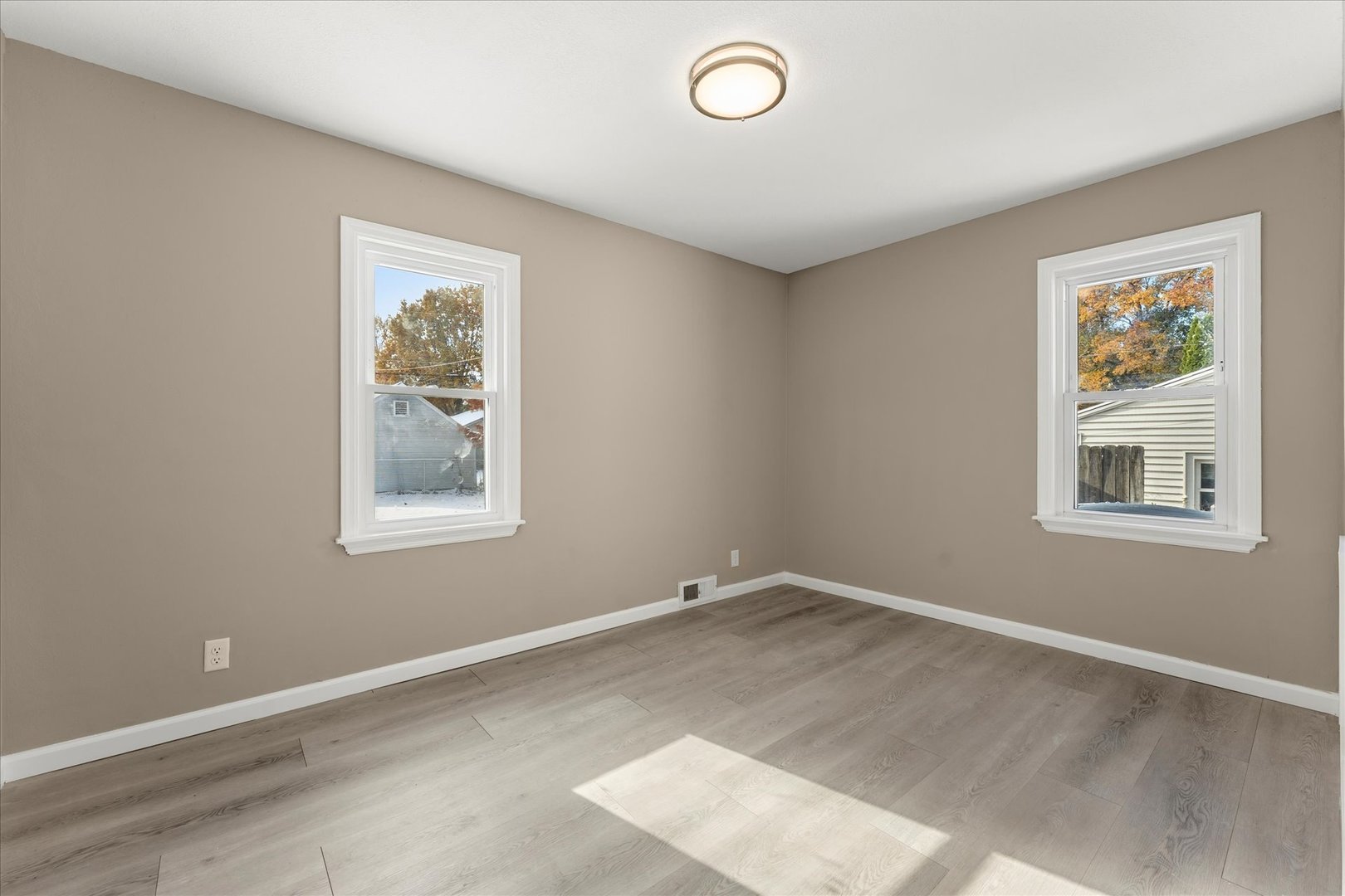 1407 West Clark Street Champaign, IL 61821 - Photo 15 of 28 an empty room with a window