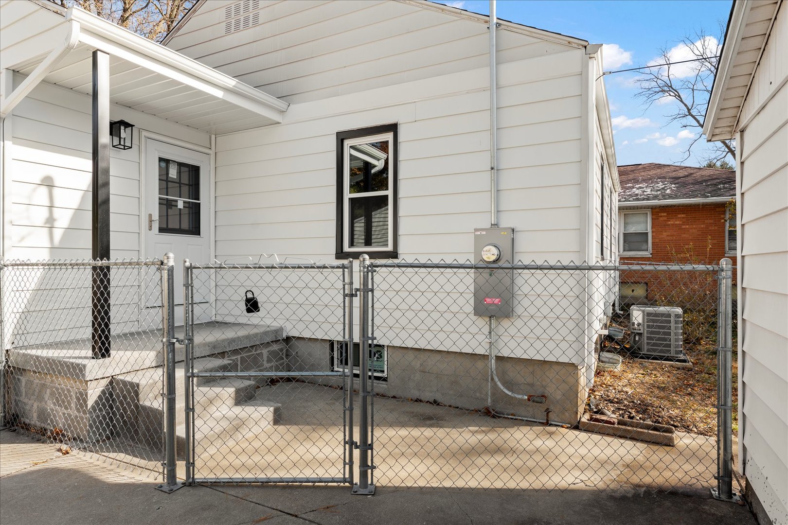 1407 West Clark Street Champaign, IL 61821 - Photo 24 of 28 a view of a house with a small entryway