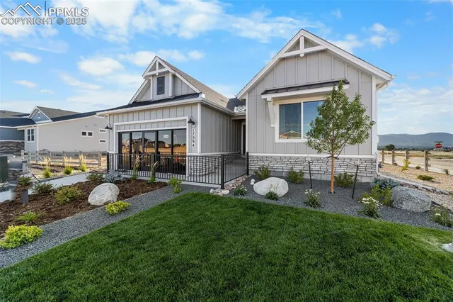 a backyard of a house with seating space