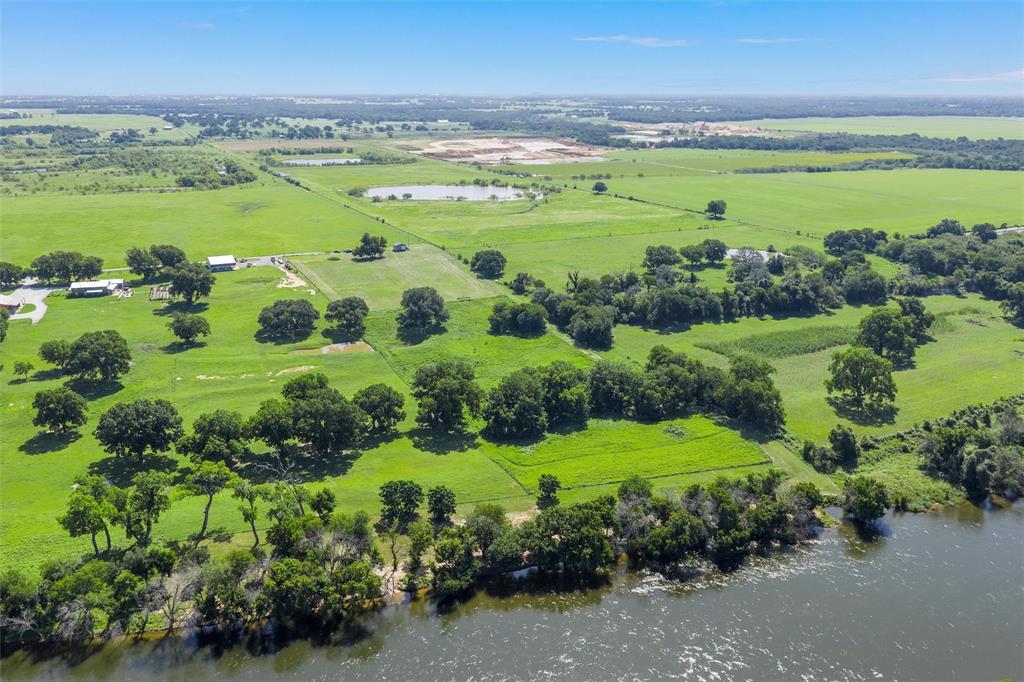 101 Private Road Aquilla, TX 76622 - Photo 6 of 19 Overview of rural landscape with a large body of water