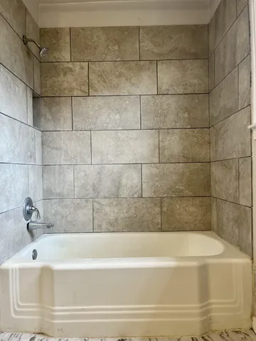 a bathroom with a bathtub