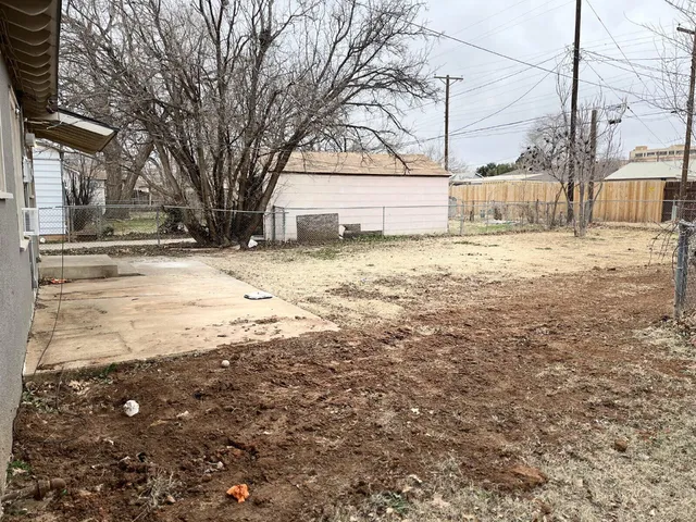 a house view with a outdoor space