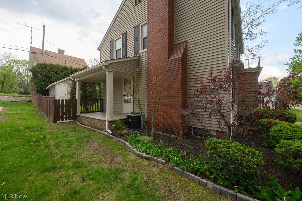 1422 Monument Road Northwest Canton, OH 44703 - Photo 24 of 31 Side of home with covered patio