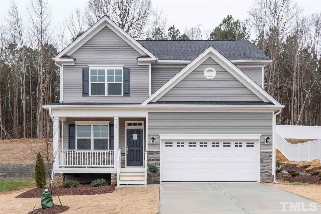 57 Ravencliff Ridge Garner, NC 27529 - Photo 1 of 25 a view of house and outdoor space