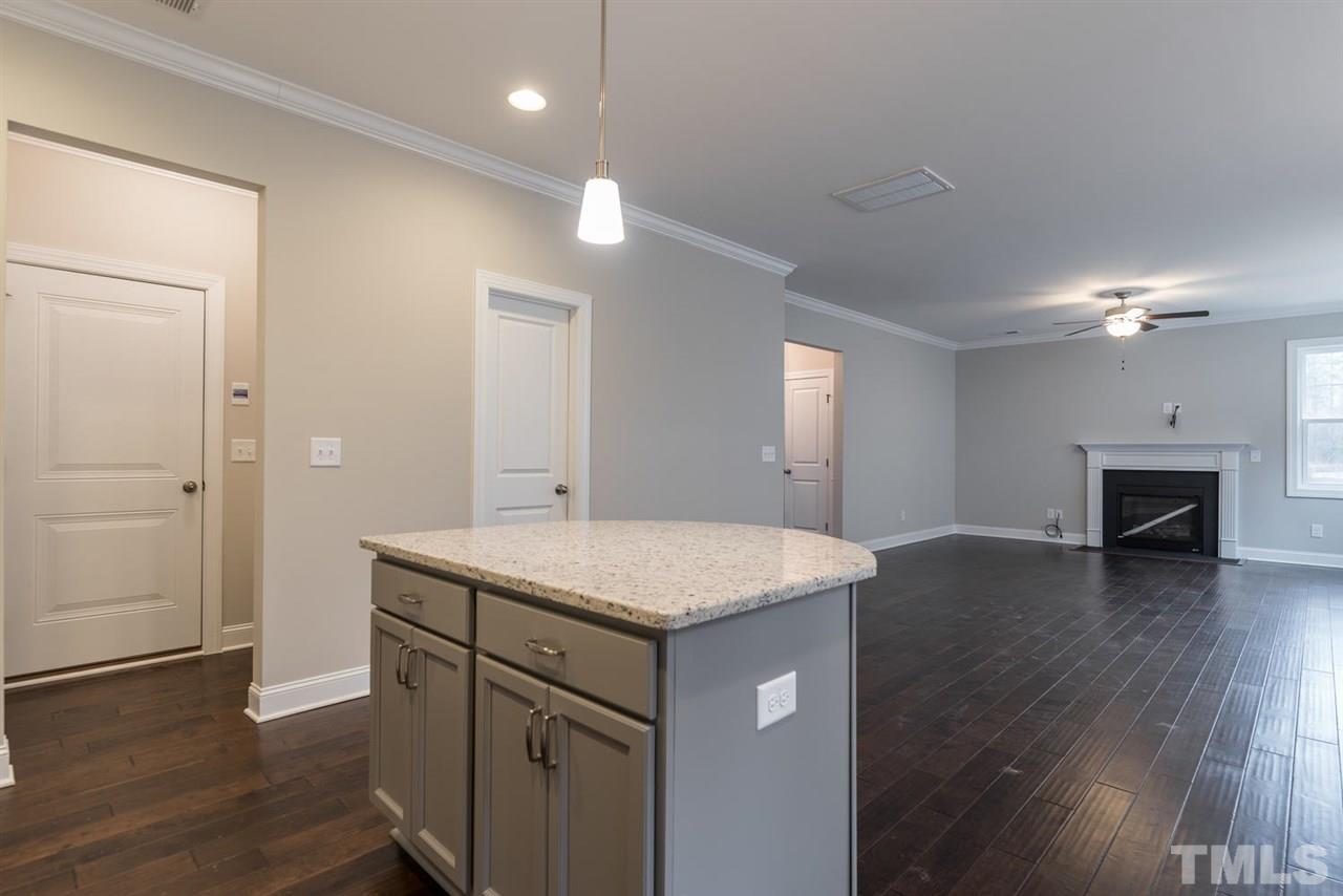 57 Ravencliff Ridge Garner, NC 27529 - Photo 12 of 25 a bathroom with a sink and a mirror