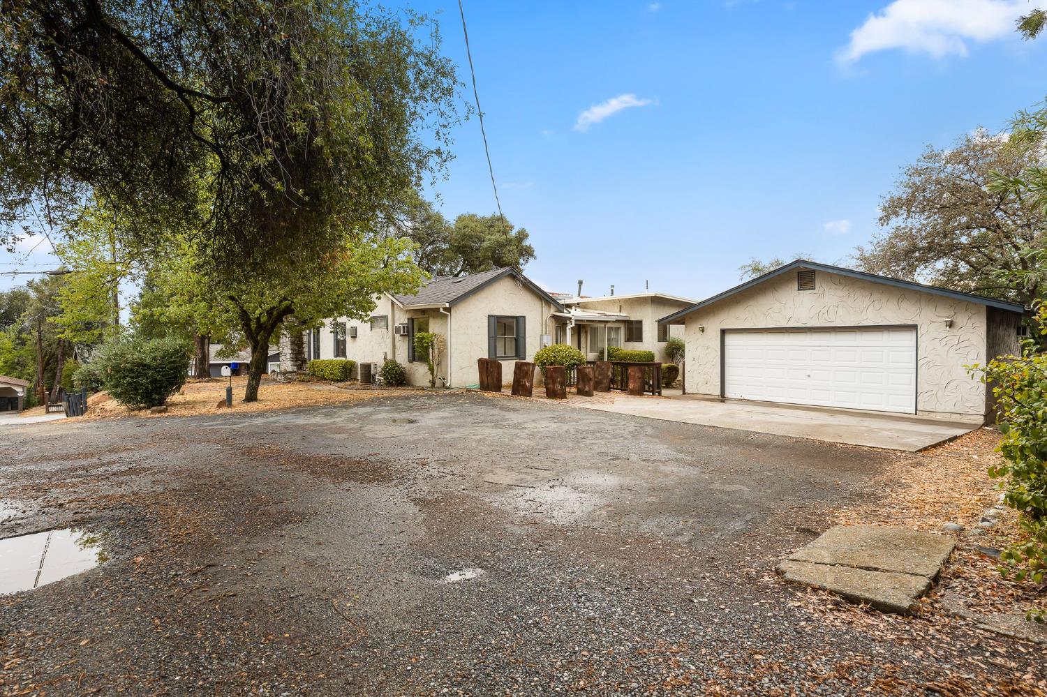 a view of house with outdoor space and street view