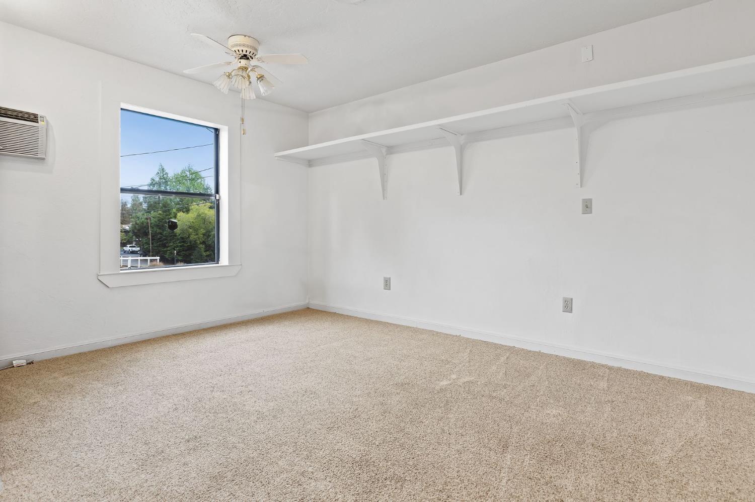 225 Flood Road Auburn, CA 95603 - Photo 20 of 30 a view of an empty room with a window