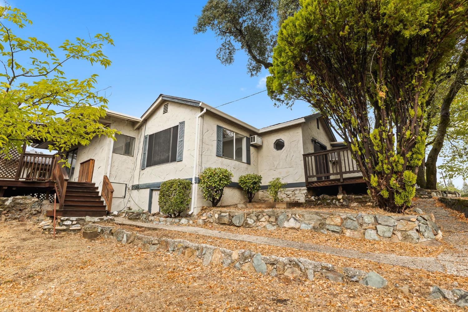 225 Flood Road Auburn, CA 95603 - Photo 27 of 30 a view of a house with a yard covered in snow