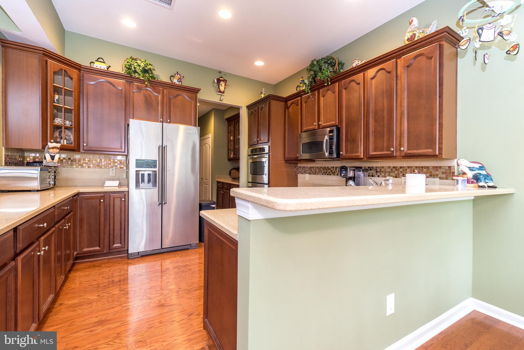 131 Mahogany Way Upper Gwynedd, PA 19446 - Photo 19 of 52 a kitchen with stainless steel appliances a sink and a refrigerator