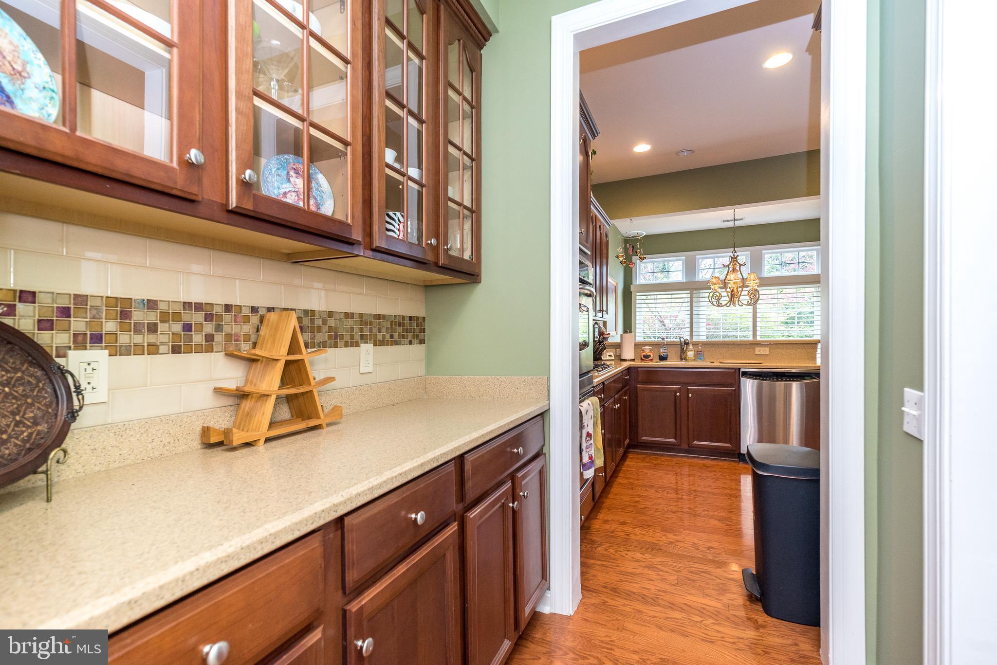 131 Mahogany Way Upper Gwynedd, PA 19446 - Photo 23 of 52 a kitchen with stainless steel appliances a sink and cabinets