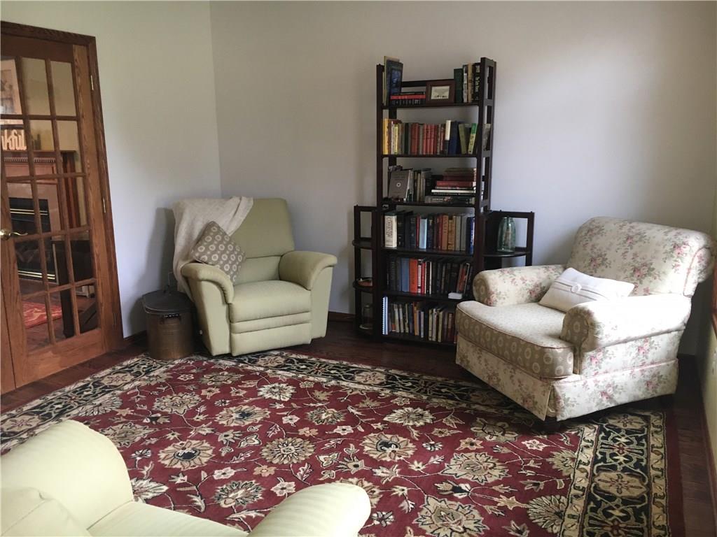 643 Neville Road Beaver, PA 15009 - Photo 7 of 25 If you open the french doors you are in the great room....but this space gives you the option of quiet reading (or your own tv!) Hardwood floors.