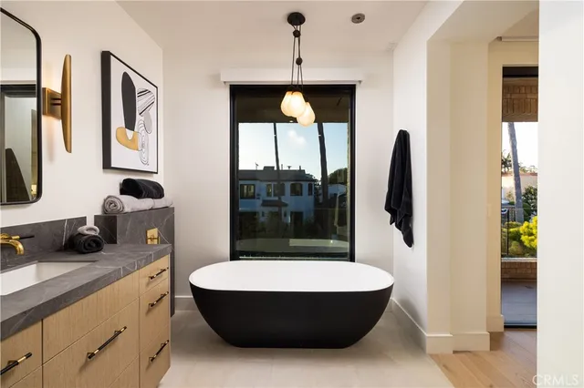 a utility room with a sink a washer and dryer
