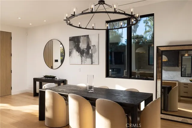 a bathroom with a granite countertop sink a mirror and vanity