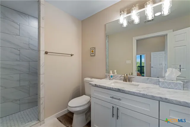 a view of a hallway view with living room