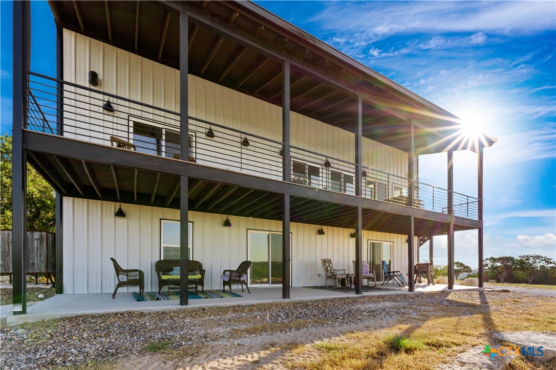 582 Delaware Creek Road Boerne, TX 78006 - Photo 10 of 48 a view of a building with sitting area