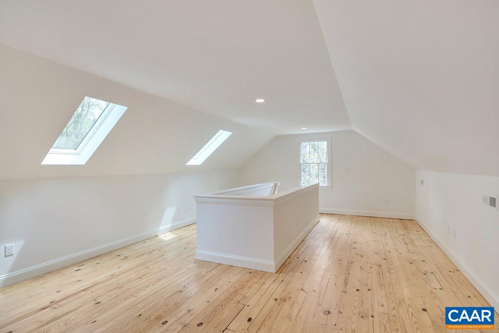1893 Westview Road Charlottesville, VA 22903 - Photo 14 of 35 a view of empty room with wooden floor and fan