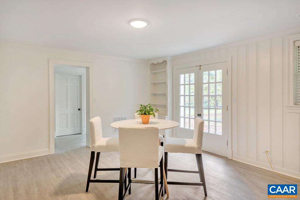 1893 Westview Road Charlottesville, VA 22903 - Photo 27 of 35 a view of a dining room with furniture and wooden floor
