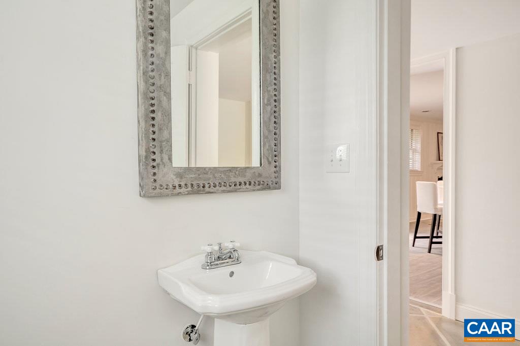 1893 Westview Road Charlottesville, VA 22903 - Photo 29 of 35 a bathroom with a sink and a mirror
