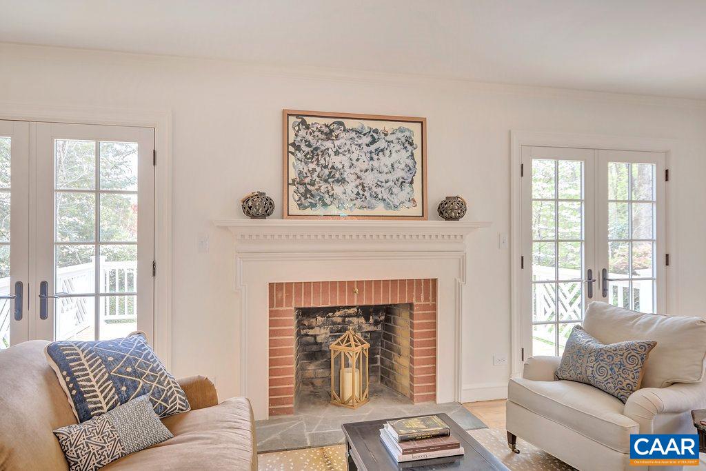 1893 Westview Road Charlottesville, VA 22903 - Photo 4 of 35 a living room with furniture and a fireplace