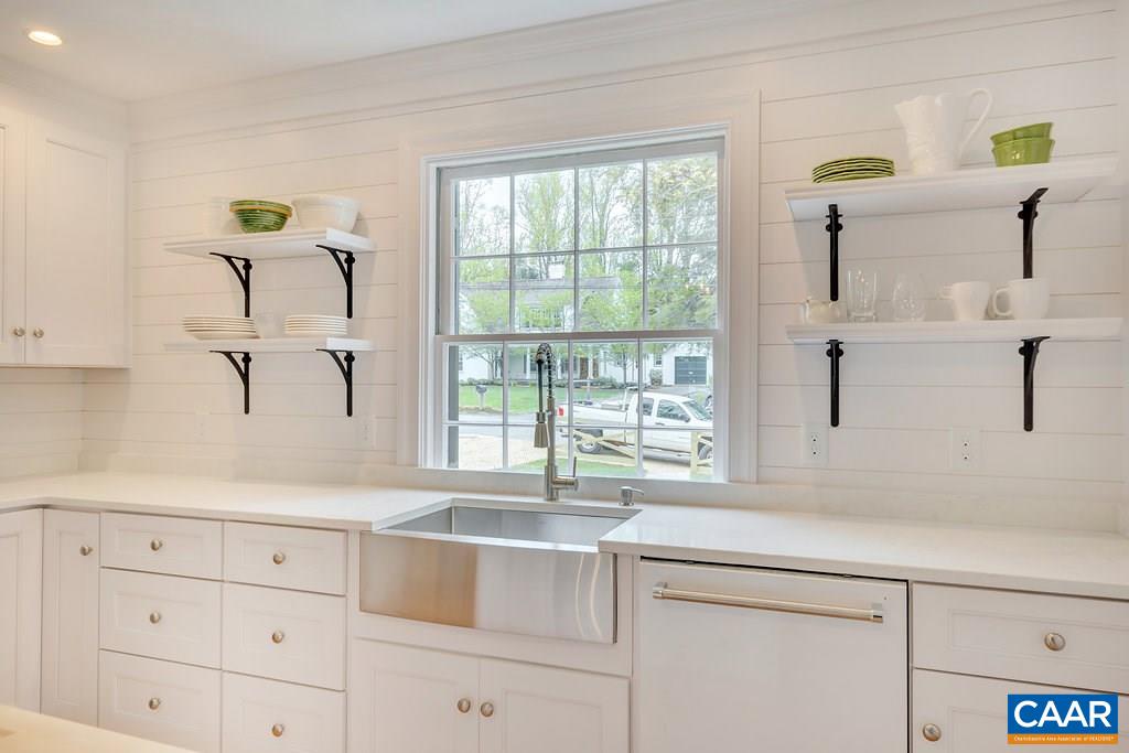 1893 Westview Road Charlottesville, VA 22903 - Photo 10 of 35 a kitchen with white cabinets and a window