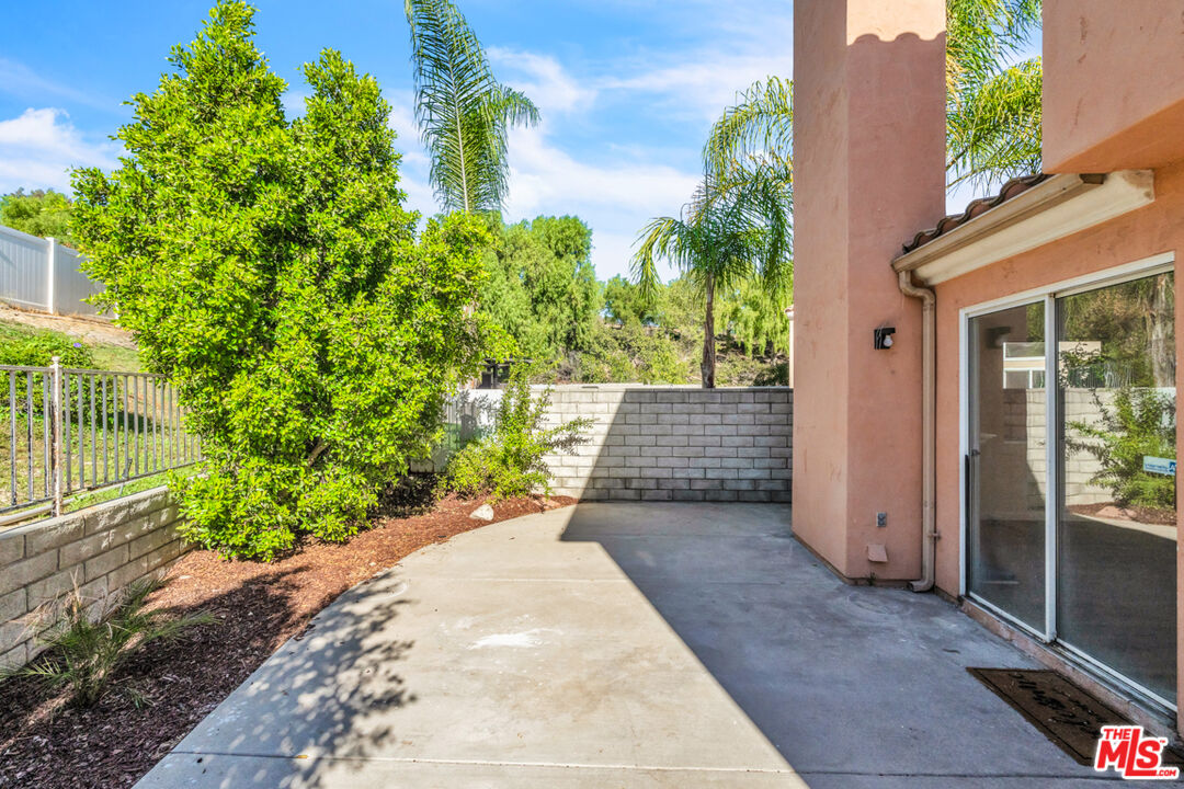 25845 Browning Place Stevenson Ranch, CA 91381 - Photo 34 of 36 a view of a backyard with plants