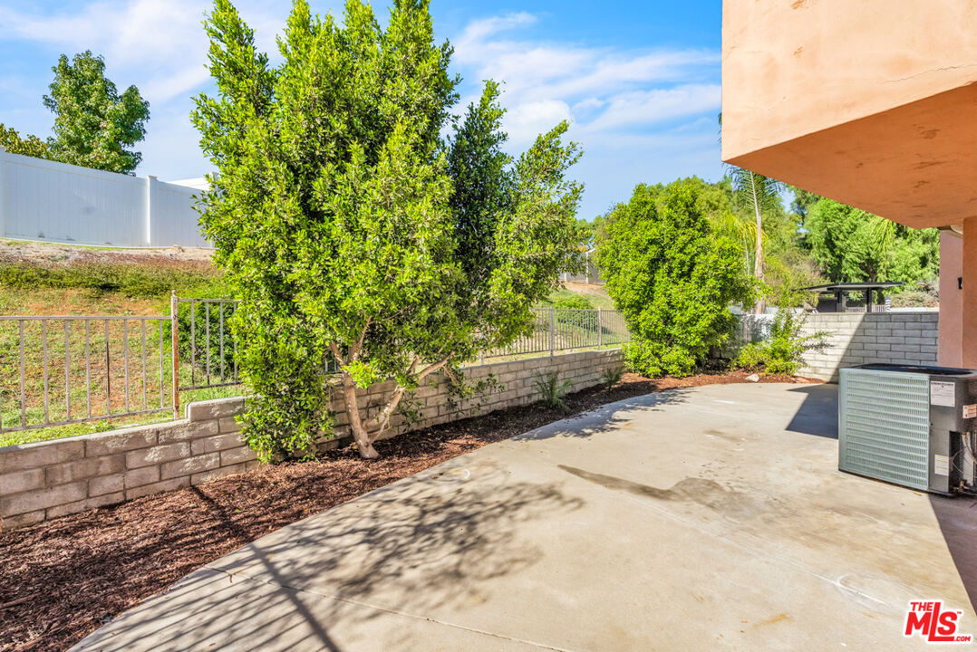 25845 Browning Place Stevenson Ranch, CA 91381 - Photo 36 of 36 a view of a garden with pathway