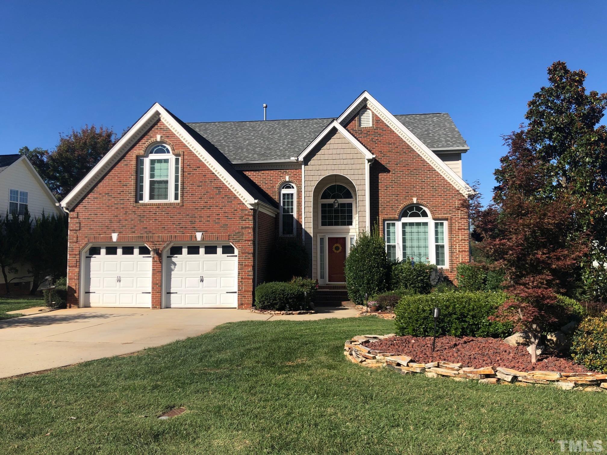 468 Seastone Street Raleigh, NC 27603 - Photo 1 of 28 a front view of a house with a yard