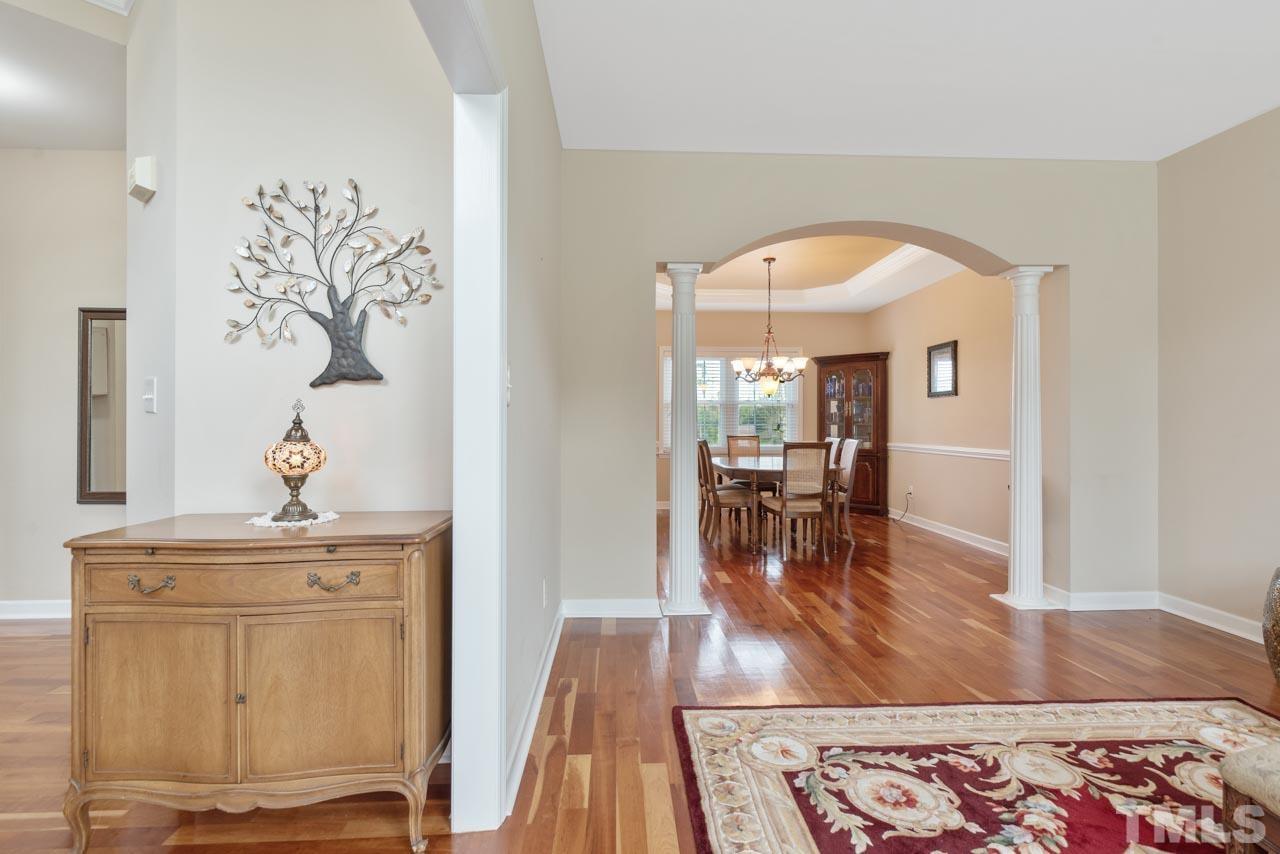 468 Seastone Street Raleigh, NC 27603 - Photo 10 of 28 a view of a living room and dining room
