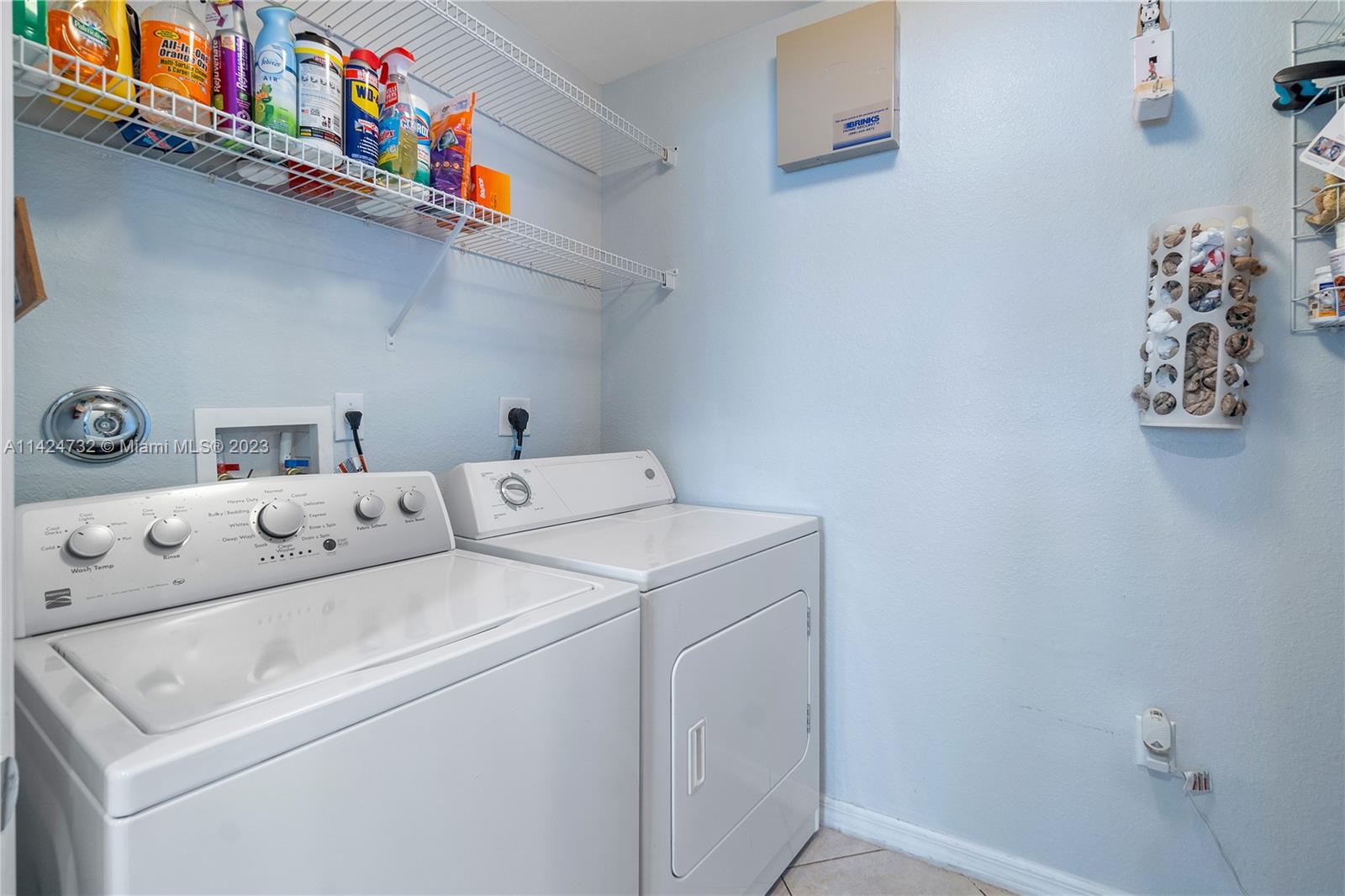 Silver Falls Miramar, FL 33027 - Photo 15 of 49 a utility room with dryer and washer