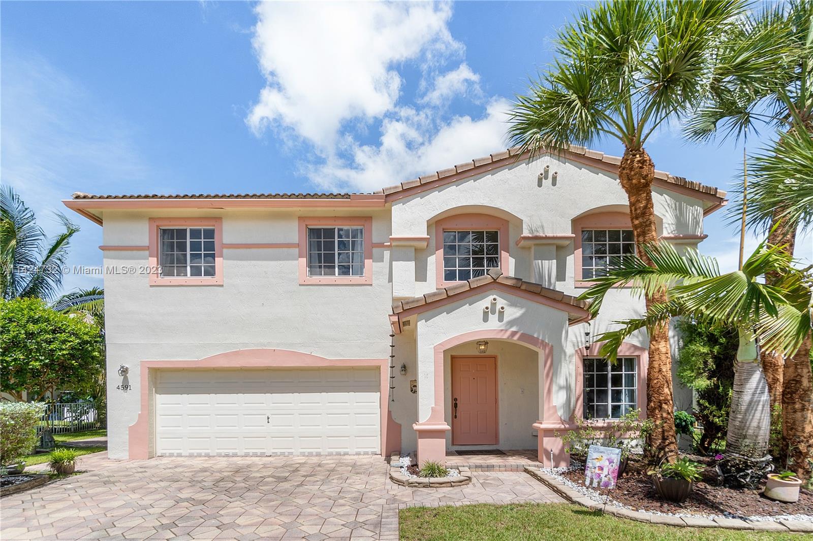 Silver Falls Miramar, FL 33027 - Photo 2 of 49 a front view of a house with garden