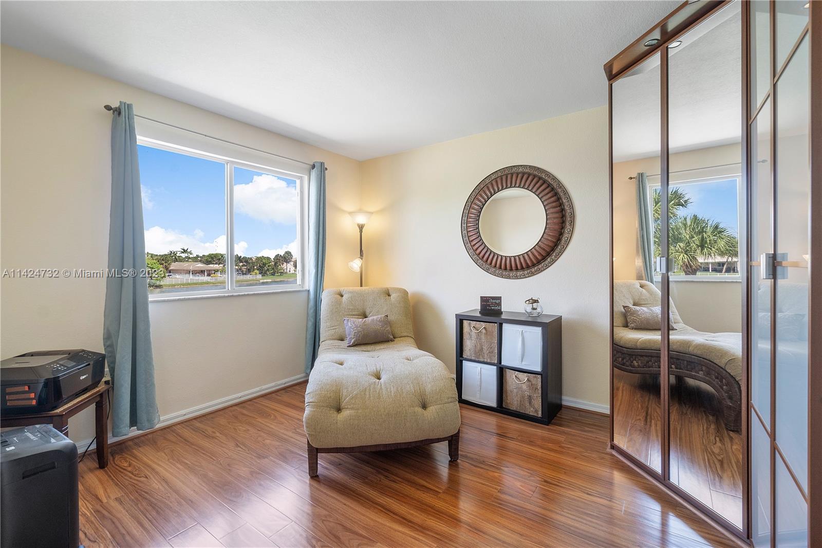 Silver Falls Miramar, FL 33027 - Photo 24 of 49 a bedroom with furniture and a large window