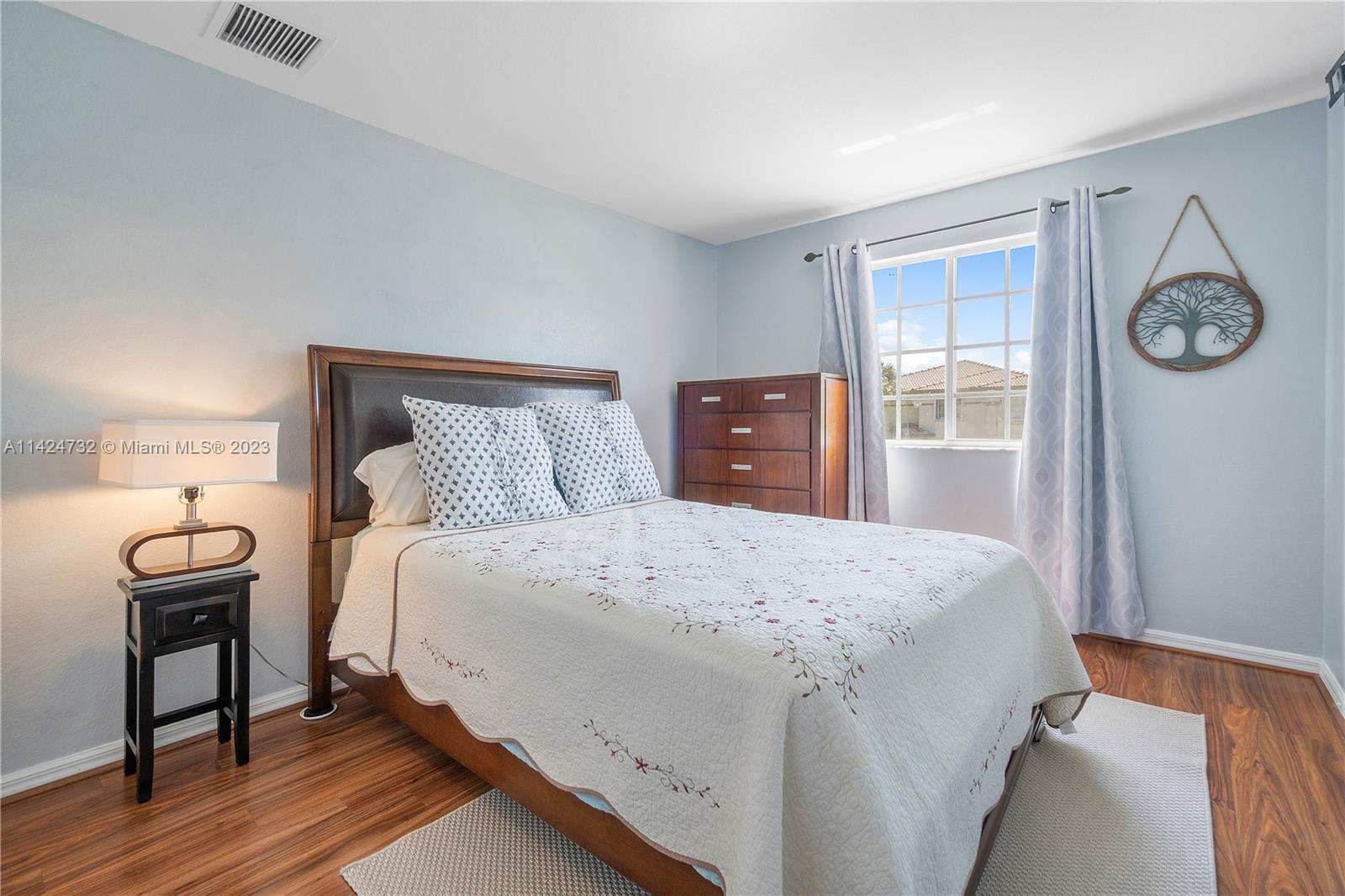 Silver Falls Miramar, FL 33027 - Photo 25 of 49 a bedroom with a bed and a closet