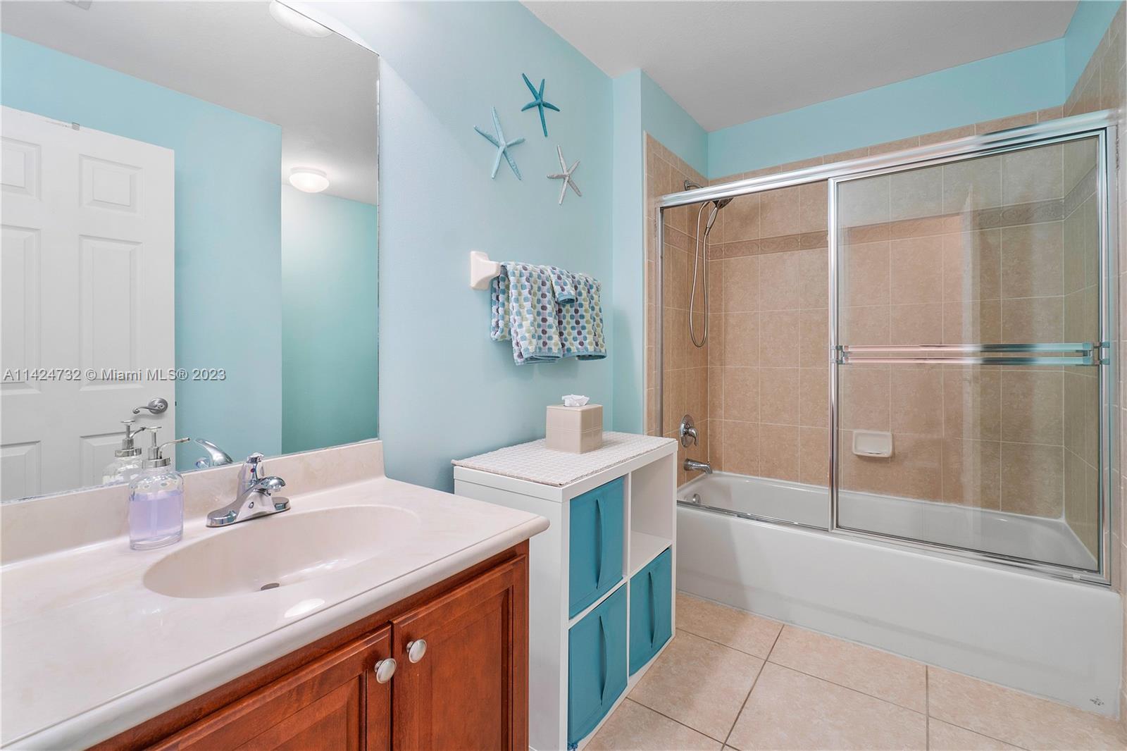 Silver Falls Miramar, FL 33027 - Photo 26 of 49 a bathroom with a sink and mirror