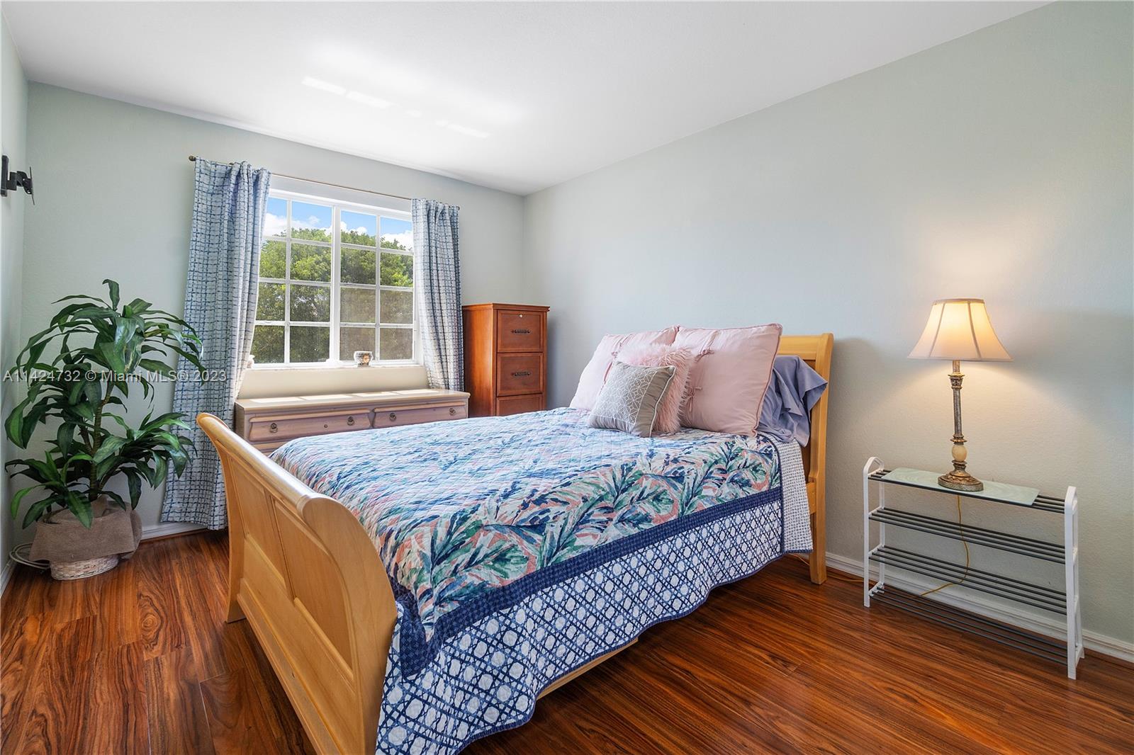 Silver Falls Miramar, FL 33027 - Photo 27 of 49 a bedroom with a bed and a window