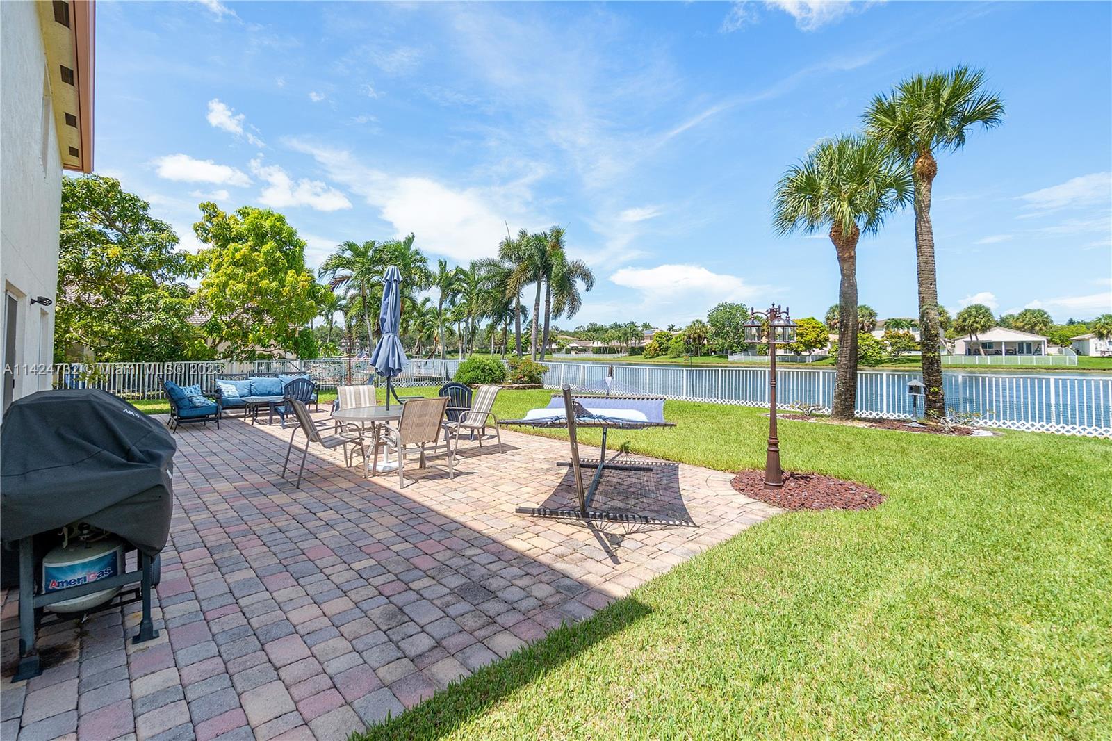 Silver Falls Miramar, FL 33027 - Photo 31 of 49 a view of a backyard with swimming pool